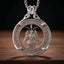 Silver cutout coin pendant necklace featuring an engraved Baphomet figure with wings and torch, inscribed "E Pluribus Unum 1893" in a hobo nickel style