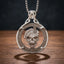 death smiles at everyone skull coin pendant necklace — military beret skull relief, gothic script inscription coin frame, skull bail, antique silver tone, dark wood surface