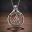 templar knight hobo coin pendant necklace — armored crusader with sword and shield hand-cut on 1879 coin face, E pluribus unum inscription, four-prong open frame, skull bail, antique silver tone, dark wood surface