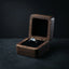 Veilhinge black walnut magnetic single ring box open with gothic ring inside on dark slate background