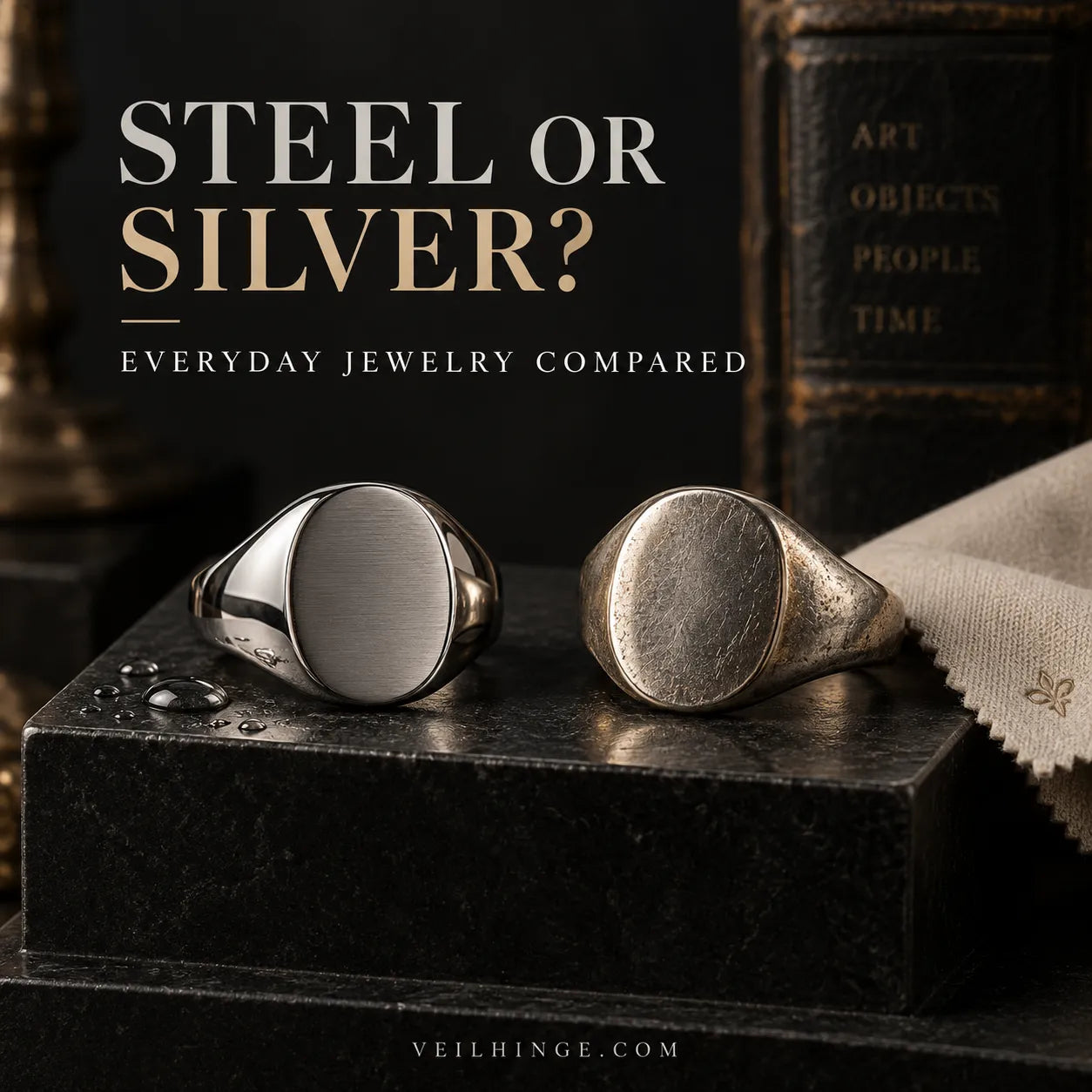 Polished stainless steel and softly patinated sterling silver signet rings compared for everyday jewelry wear.