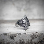 Ace of spades ring with baroque scroll engraving and ACE OF SPADES banner inscription, polished stainless steel dark aesthetic biker ring by Veilhinge, front view
