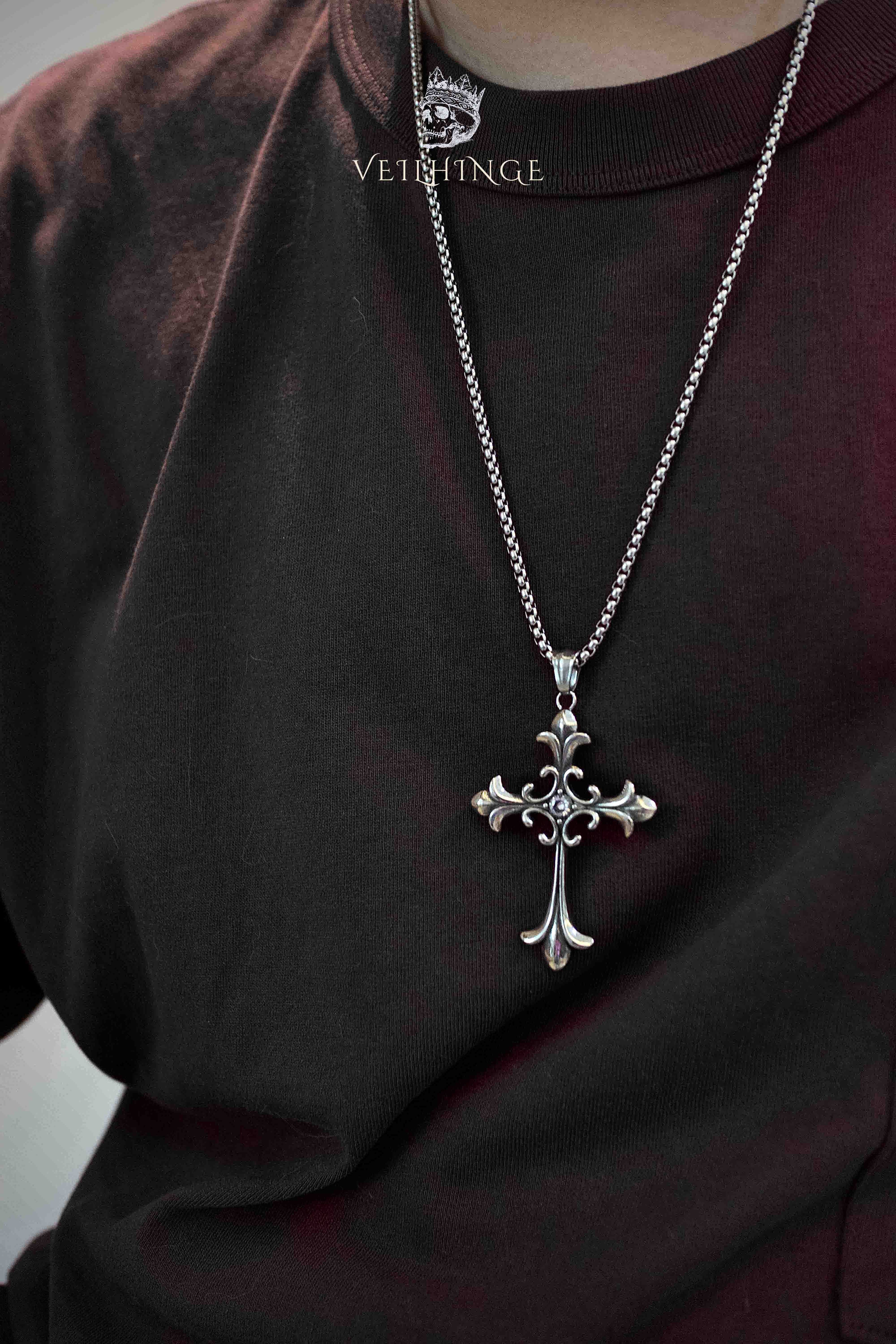 Baroque fleur cross pendant necklace worn on model with dark outfit, ornate gothic cross statement necklace, dark aesthetic alternative jewelry