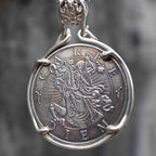 Reverse side of coin pendant showing Carpe Diem grim reaper on horseback engraving, set in silver bezel mount