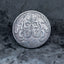 Coin pendant engraved with a skull merging into octopus tentacles spreading across the coin face, Liberty inscription, dated 1937, set in a four-prong bezel on a chain