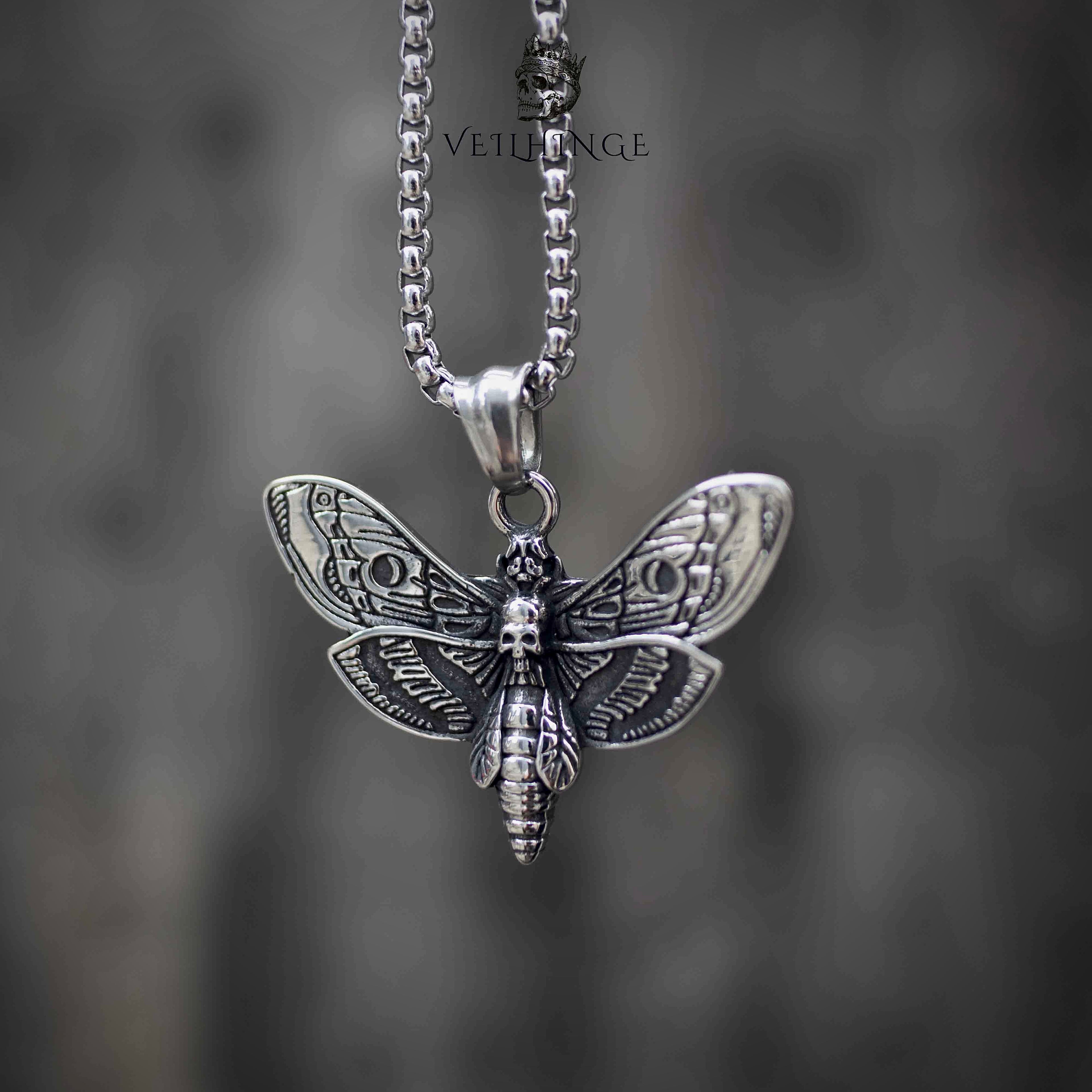 Death's head moth skull pendant necklace front view, engraved wing detail with skull body, oxidized silver, dark aesthetic gothic jewelry