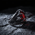 demon eye ring close up with red core and skeleton details