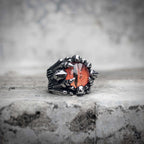 Dragon claw ring with orange red gemstone setting in oxidized silver stainless steel, gothic dark aesthetic statement ring by Veilhinge, front view