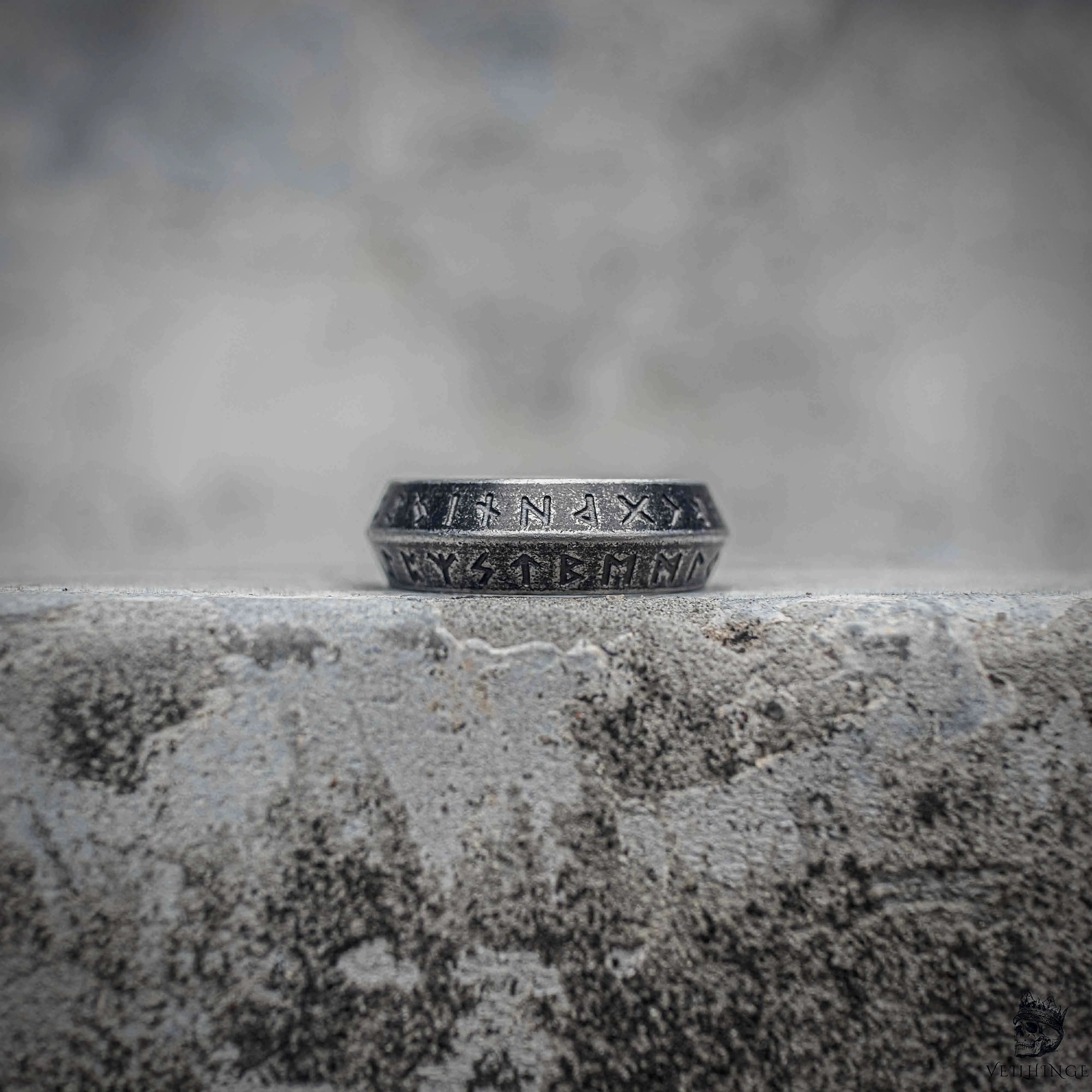 Elder Futhark rune ring with double row Norse rune engraving on sandblasted antique silver stainless steel, minimalist Viking dark aesthetic band ring by Veilhinge, front view