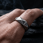 geometric faceted stainless steel ring worn on hand vintage band ring