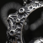 crescent moon pendant texture close up antique silver gothic jewelry craftsmanship