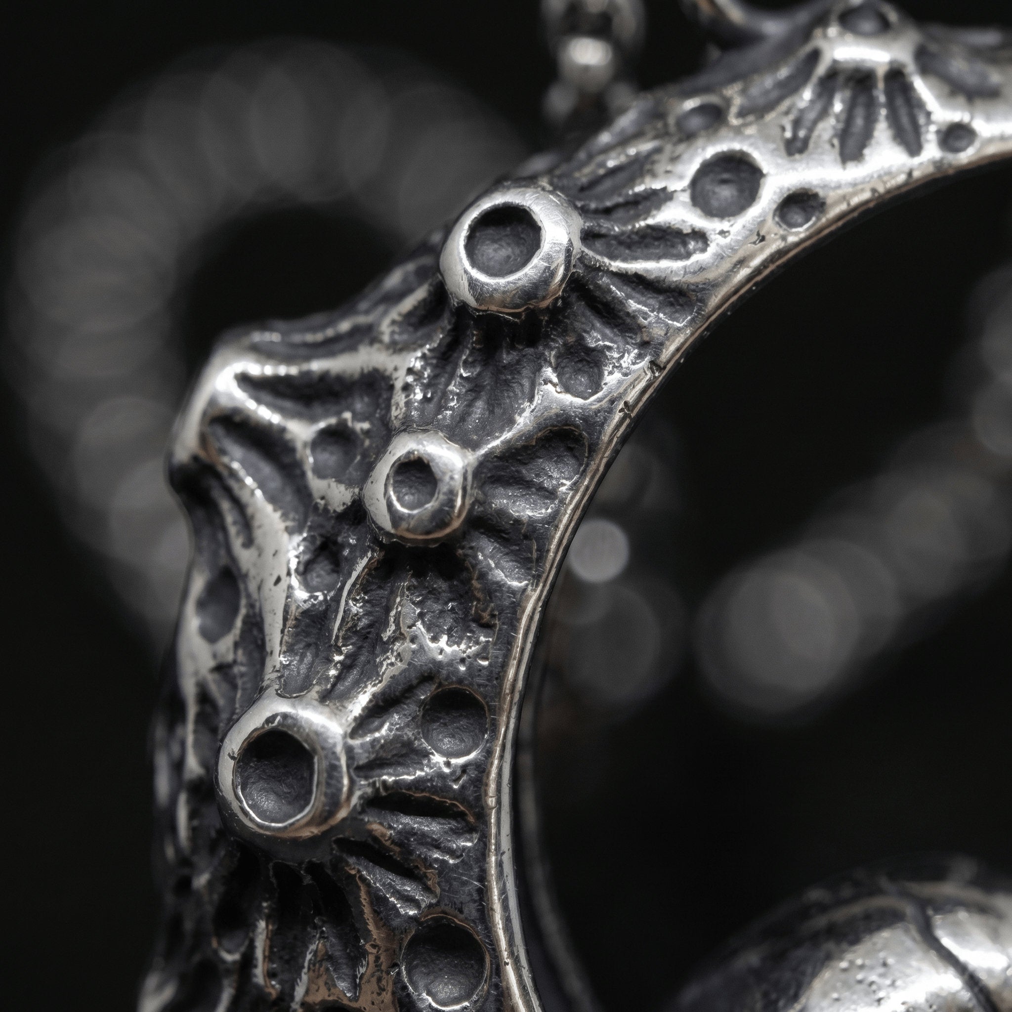 crescent moon pendant texture close up antique silver gothic jewelry craftsmanship