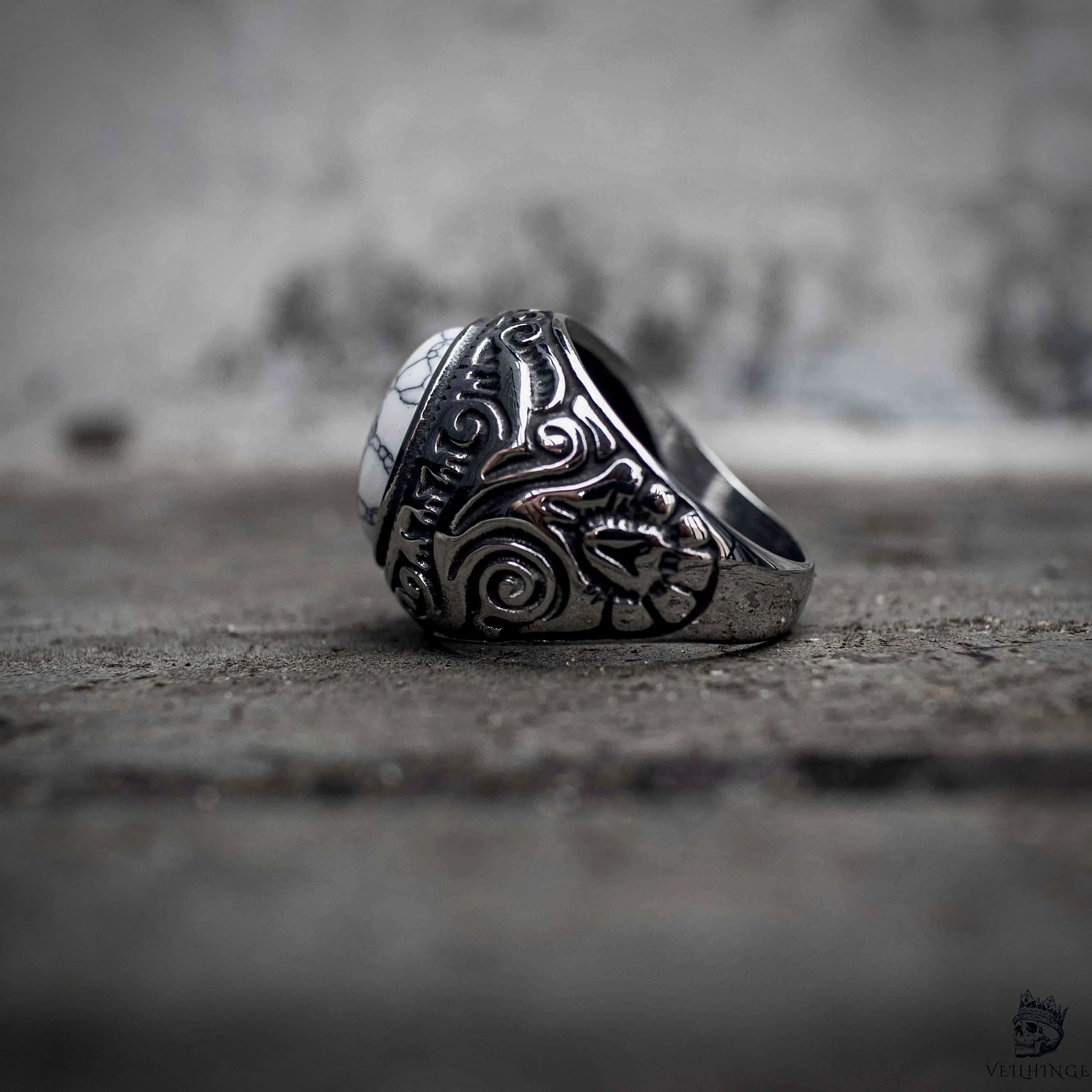 Gothic signet ring side view showing tribal carved band and interior, dark aesthetic stainless steel jewelry by Veilhinge