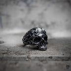 Dark aesthetic skull ring with baroque floral engraving in oxidized stainless steel, side view