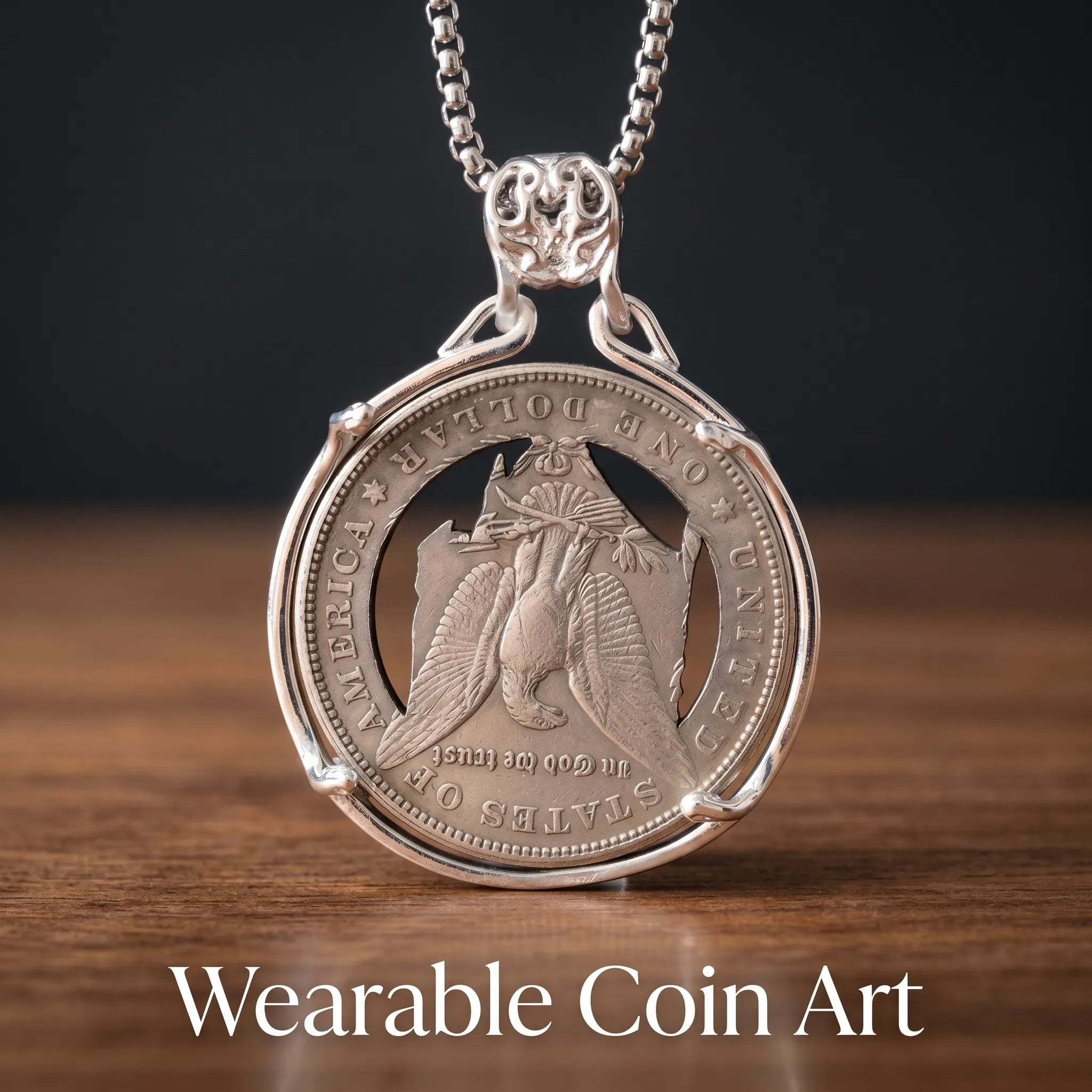coin art pendant reverse side — Morgan dollar eagle motif with ONE DOLLAR United States of America inscription in four-prong circular mount, skull bail