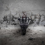 Gothic grim reaper dragon claw ring side view showing skull reaper engraving with red stone, dark aesthetic oxidized stainless steel ring by Veilhinge