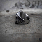 Grim reaper signet ring side view showing polished stainless steel band and engraved face detail, gothic dark aesthetic ring by Veilhinge