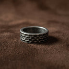 hammered texture ring close up on hand stainless steel vintage band ring