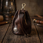 Handcrafted full-grain leather belt pouch with antique Buffalo Nickel concho and leather cord drawstring closure