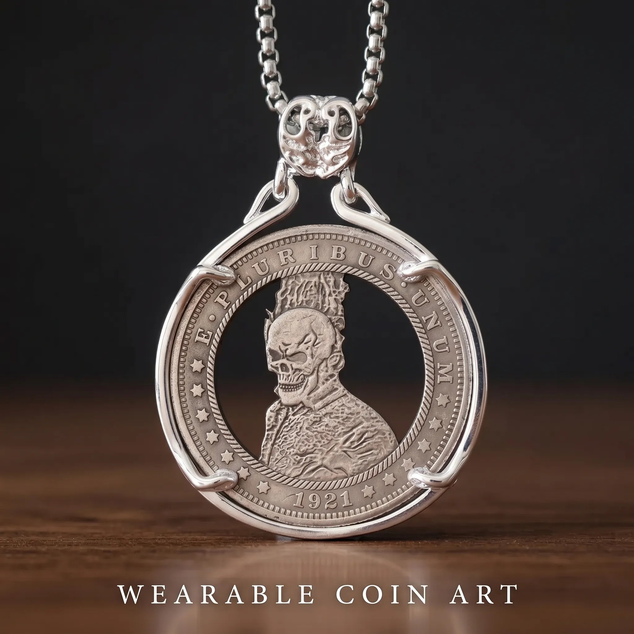 hobo nickel skull coin pendant necklace — 1921 dollar coin with skull portrait engraving in open circular silver frame, skull bail on box chain