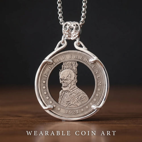 hobo nickel skull coin pendant necklace — 1921 dollar coin with skull portrait engraving in open circular silver frame, skull bail on box chain