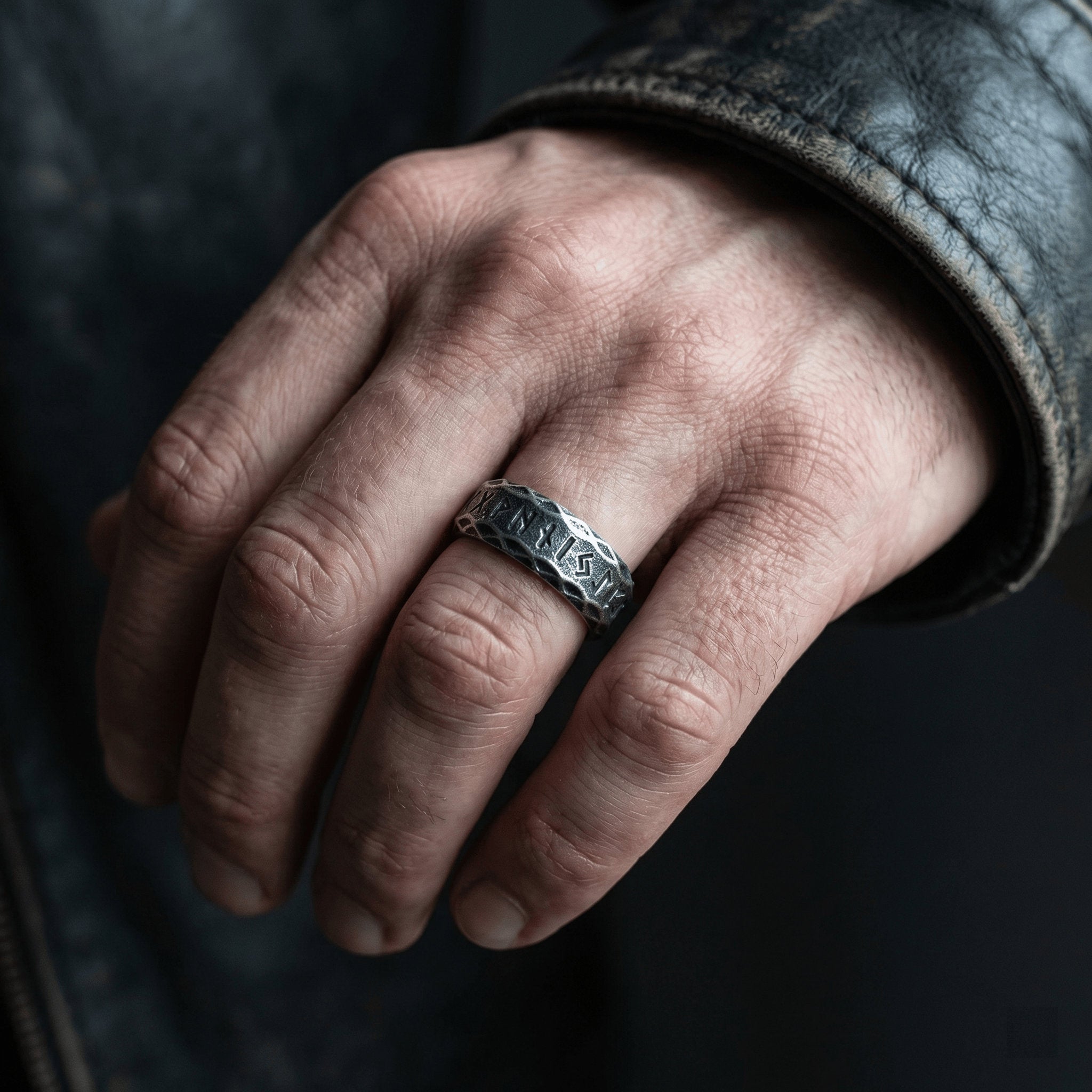 men wearing rune spinner ring stainless steel rotating band lifestyle shot