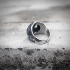 Mjolnir Viking ring back view showing lightning ray band engraving and polished stainless steel interior, Norse dark aesthetic ring by Veilhinge