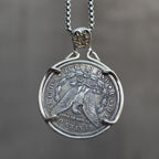 Dapper cat coin pendant reversed to show the Morgan Dollar eagle with One Dollar inscription, held in a four-prong open bezel on a chain