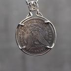 Moon goddess coin pendant reversed to show the Morgan Dollar eagle with One Dollar inscription, held in a four-prong open bezel on a chain