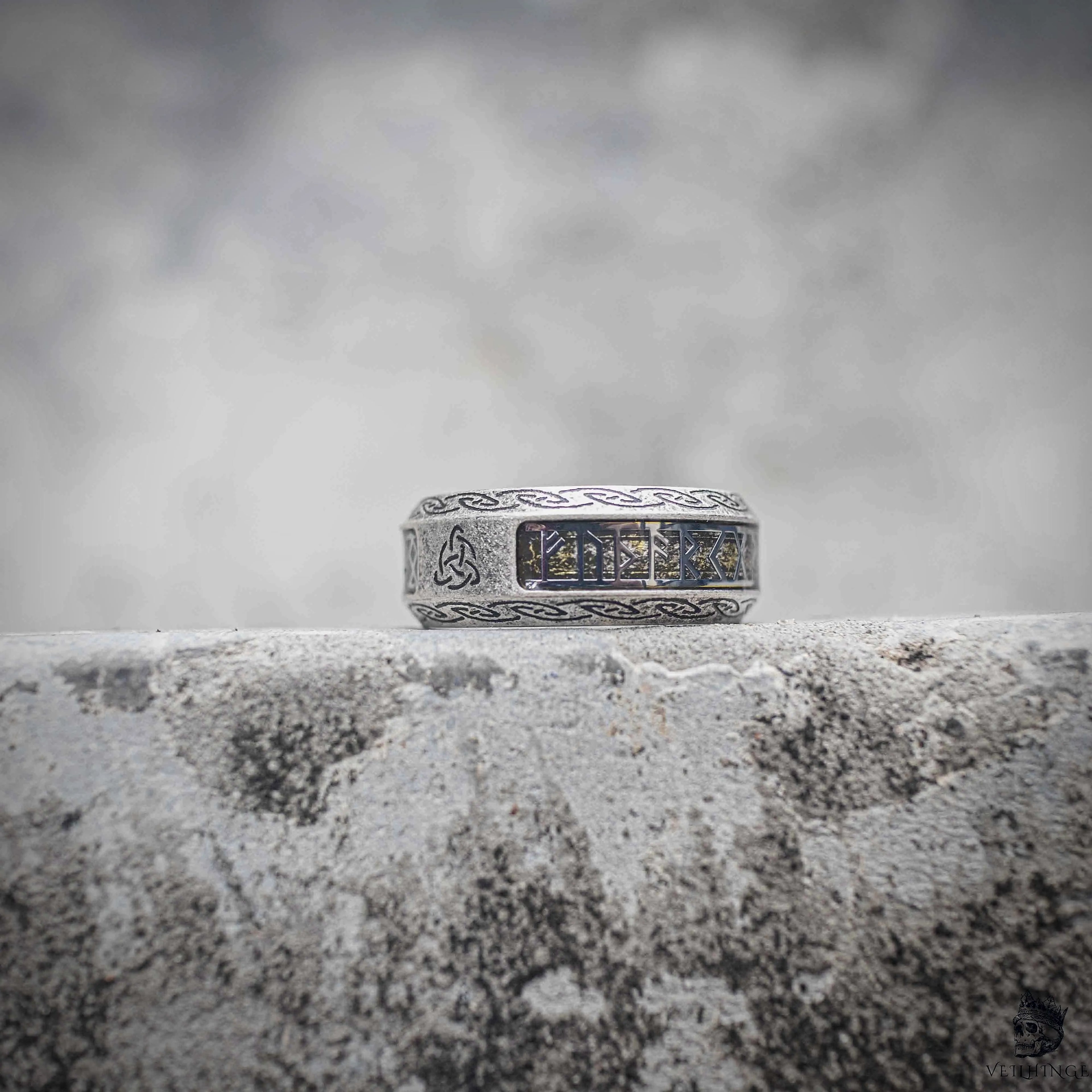 Norse rune band ring side view showing Celtic knot border and Triquetra engraving on sandblasted stainless steel, Viking dark aesthetic ring by Veilhinge