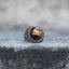 Oversized tiger eye signet ring with a gold-tone rope bezel, front view
