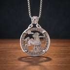 sagittarius centaur coin pendant necklace — centaur archer hand-cut on coin face with alchemical symbol border, flames at base, four-prong open frame, skull bail, antique silver tone, dark wood surface