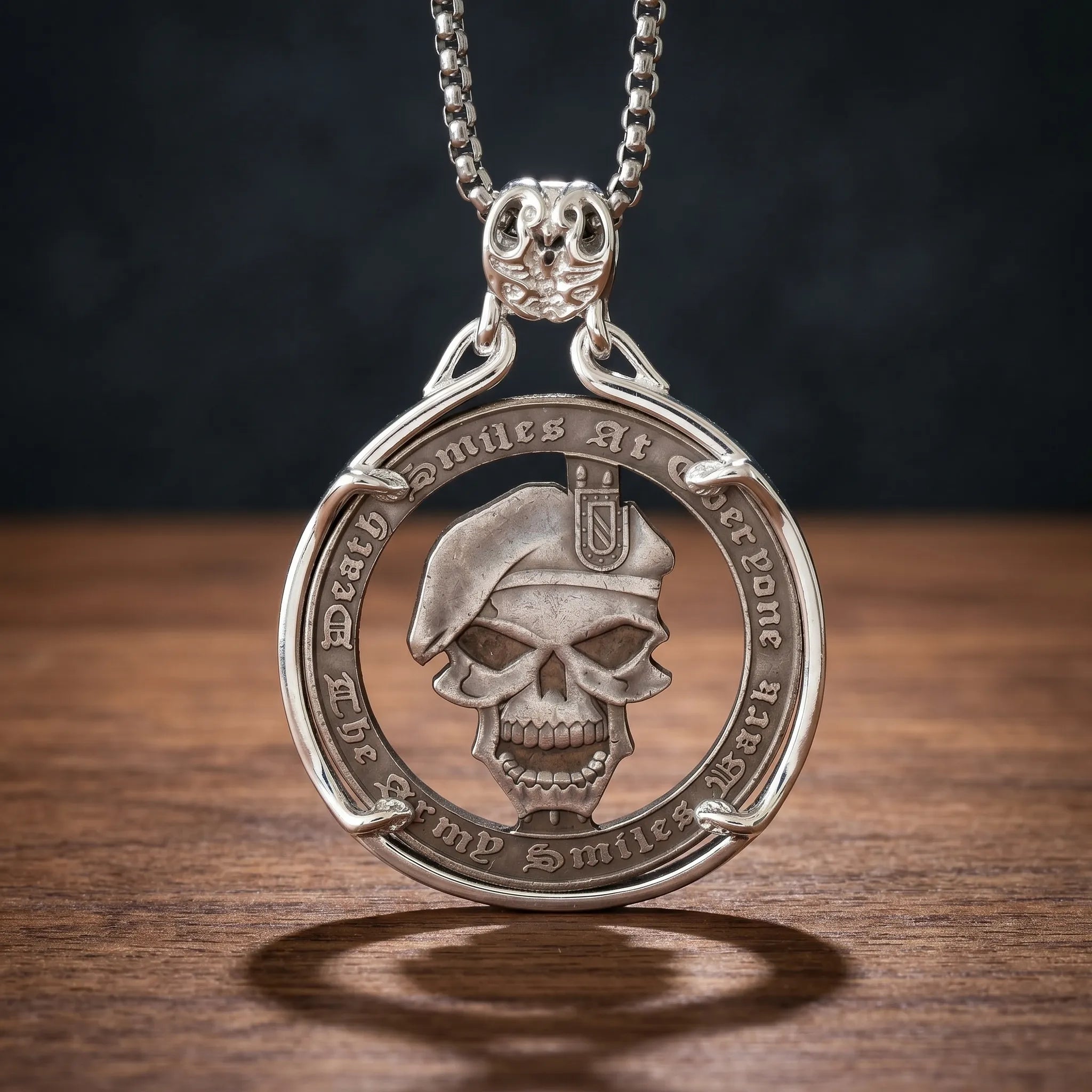 death smiles at everyone skull coin pendant necklace — military beret skull relief, gothic script inscription coin frame, skull bail, antique silver tone, dark wood surface Main image