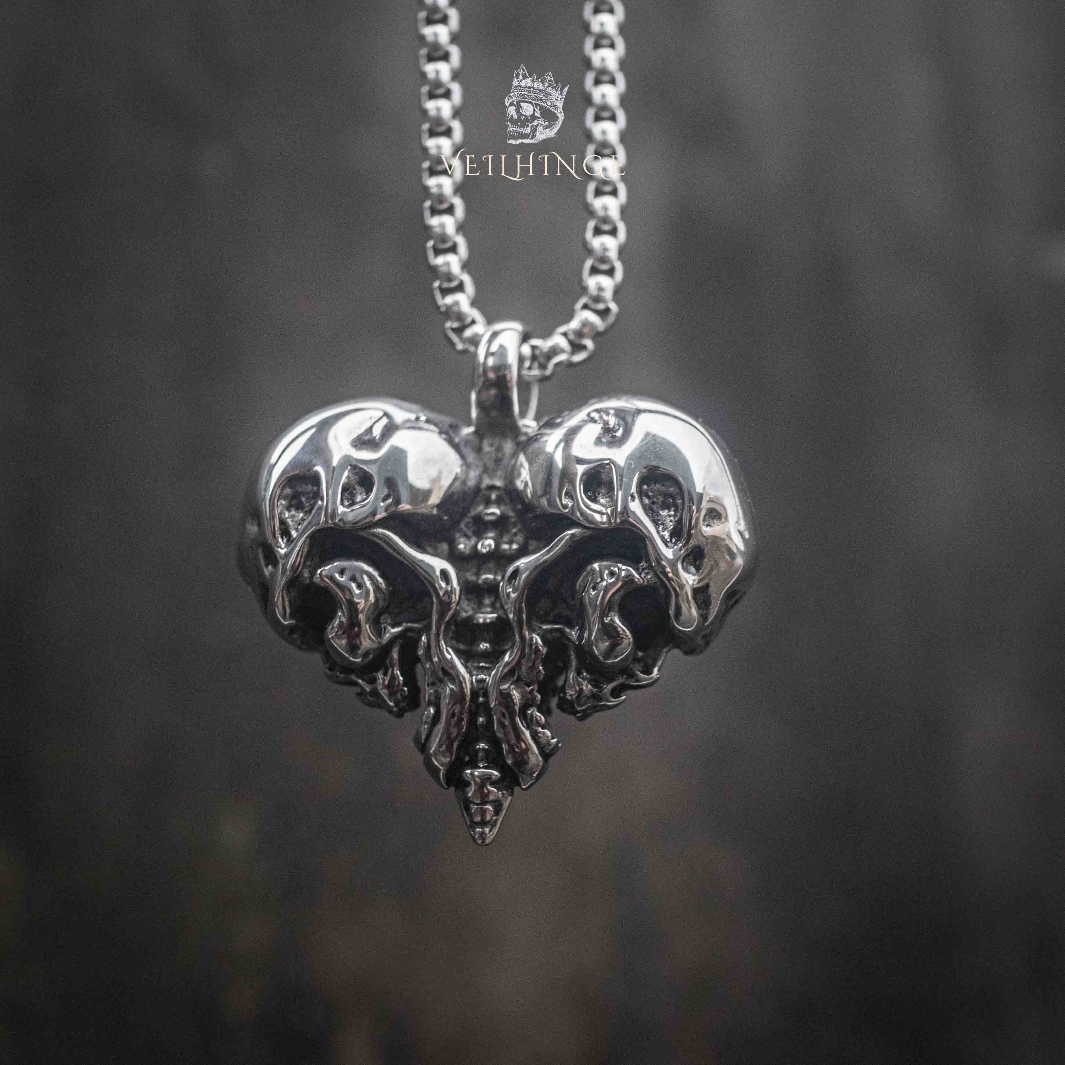 skull heart pendant on full box chain — black and white editorial shot showing pendant scale and chain length Main image