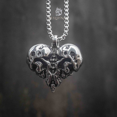 skull heart pendant on full box chain — black and white editorial shot showing pendant scale and chain length