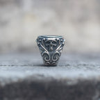 Skull and scrollwork details on the side of the mirror signet ring