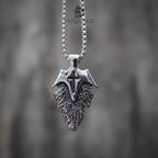 Wing cross pendant necklace back view, engraved cross with spread feather wings, oxidized silver finish, gothic dark aesthetic necklace