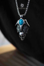 Wing cross pendant necklace back view worn on model, gothic cross with feathered wings, oxidized silver, dark aesthetic alternative jewelry