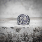 Thor hammer Mjolnir signet ring with rune border circle and Norse Viking engraving in polished stainless steel, dark aesthetic medieval ring by Veilhinge, front view