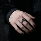 Vamp Romantic skeleton gothic ring worn on hand with black nails – adjustable tarnish-resistant skull spine band in dark romance aesthetic