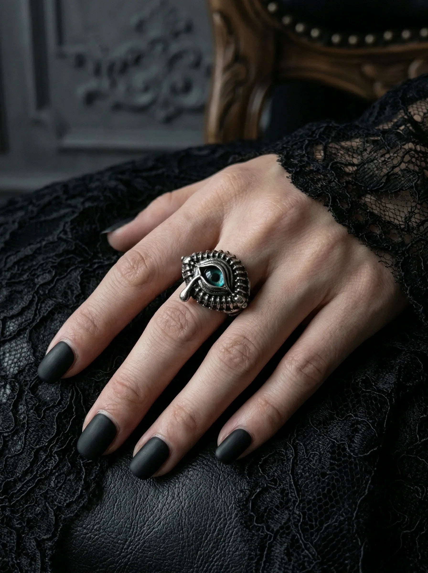 Veilhinge Gothic Crying Tear Eye Ring worn on hand with black lace, pupil crystal eye detail, dark academia style
