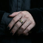 Veilhinge Gothic Eye Ring worn on male hand with black velvet sleeve, dark gothic style