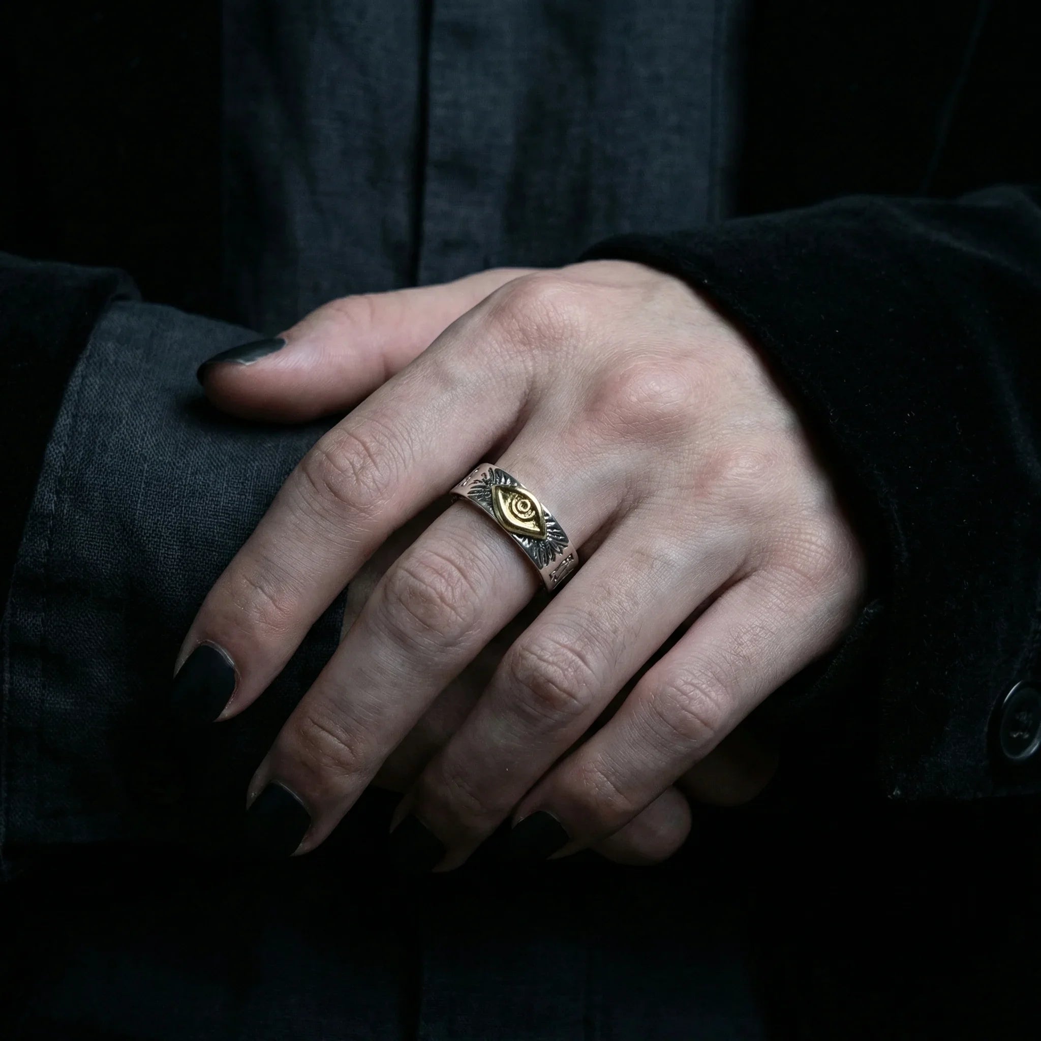 Veilhinge Gothic Eye Ring worn on male hand with black velvet sleeve, dark gothic style