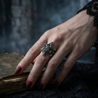 Gothic Skull Jaw Ring worn on female hand with black lace sleeve, separable upper and lower jaw skull design