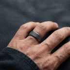 minimal nordic ring worn on hand with dark aesthetic everyday styling