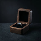 Veilhinge black walnut magnetic single ring box open with gothic ring inside on dark slate background