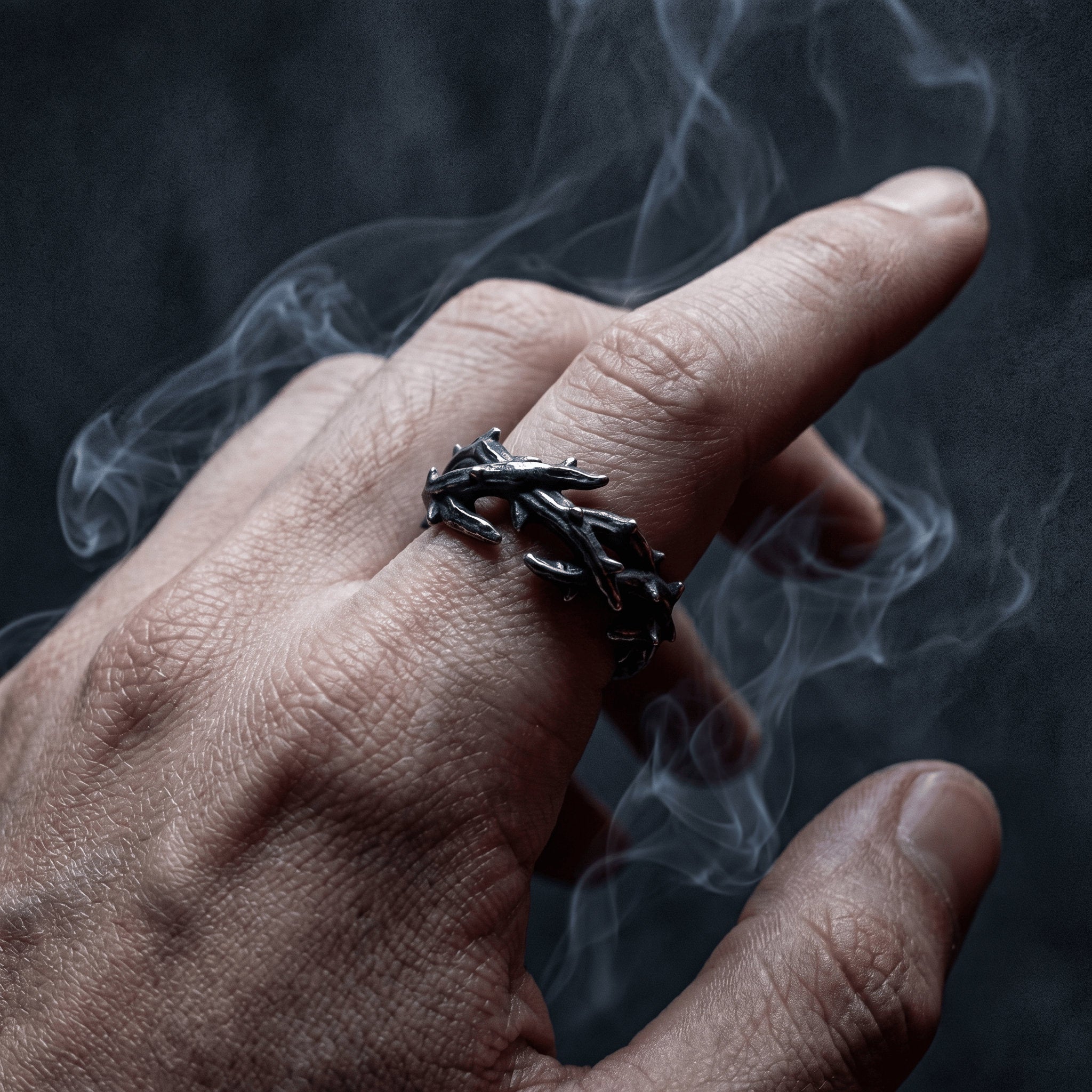 barbed thorn ring worn on hand dark aesthetic stainless steel ring with white smoke
