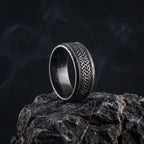 nordic woven ring stainless steel band with rune engraving dark minimal style