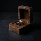 Gothic claw ring with moonstone set in dark stainless steel, presented in a walnut wood jewelry box — Veilhinge dark luxury gothic ring