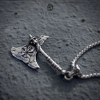 Viking battle axe pendant necklace flat lay, Celtic knotwork blade detail with box chain, oxidized silver, Norse mythology jewelry
